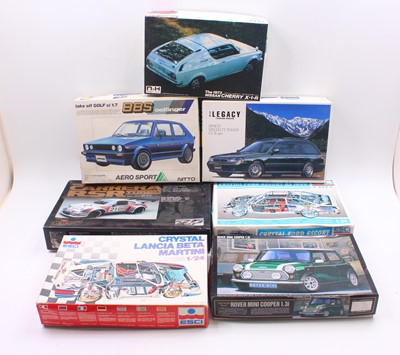Lot 723 - Seven boxed mainly 1/24 scale plastic vehicle...