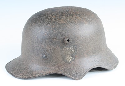 Lot 3048 - A German model 1918 steel combat helmet with...