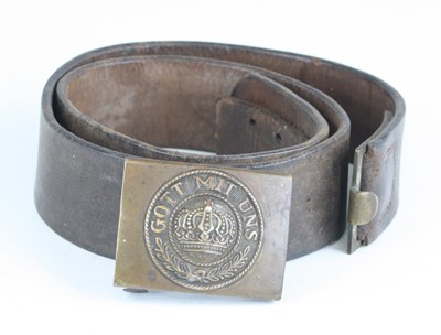 Lot 3051 - An Imperial German leather belt, the brass...