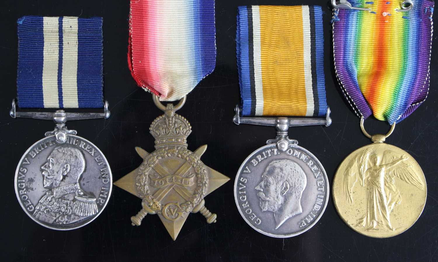 Lot 3331 - A Naval group of four medals to include...
