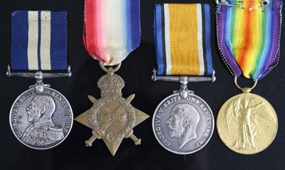 Lot 3331 - A Naval group of four medals to include...