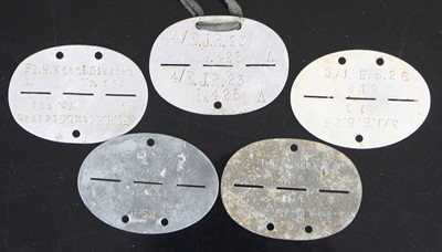 Lot 3060 - A German identity disc, the oval zinc disc...
