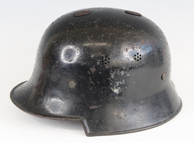 Lot 3067 - A German Third Reich M34 Stahlhelm, in black...