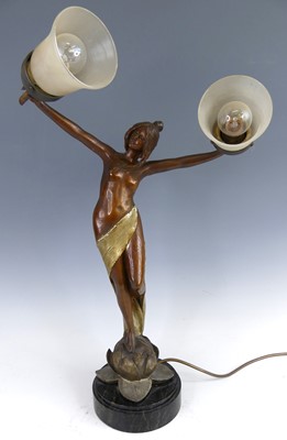 Lot 184 - An Art Nouveau painted spelter twin branch...