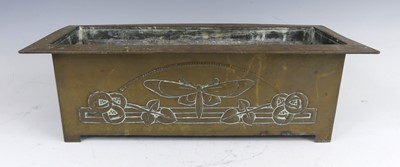 Lot 172 - An Arts & Crafts Glasgow School style brass...