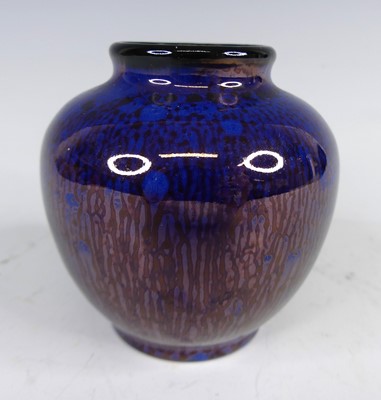 Lot 2 - A small early 20th century lustre glazed...