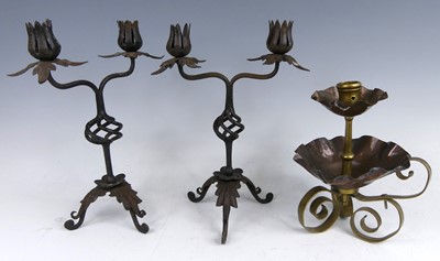 Lot 169 - An Arts & Crafts copper and brass chamberstick,...
