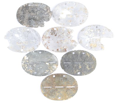 Lot 3089 - A German identity disc, the oval zinc disc...