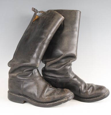 Lot 3093 - A pair of WW II black leather boots, each with...