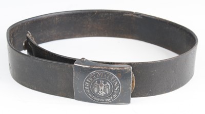 Lot 3096 - A German Third Reich brown leather belt, the...