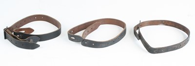 Lot 3097 - A German brown leather helmet chin strap, the...