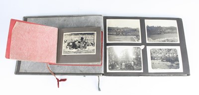 Lot 3099 - A WW II German photograph album, the contents...