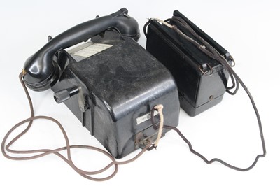 Lot 3114 - A WW II German bunker field telephone, the...