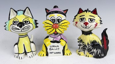 Lot 94 - Lorna Bailey - three seated cats, each bright...