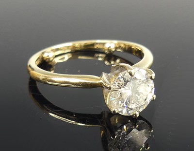 Lot 2114 - A yellow and white metal diamond solitaire...
