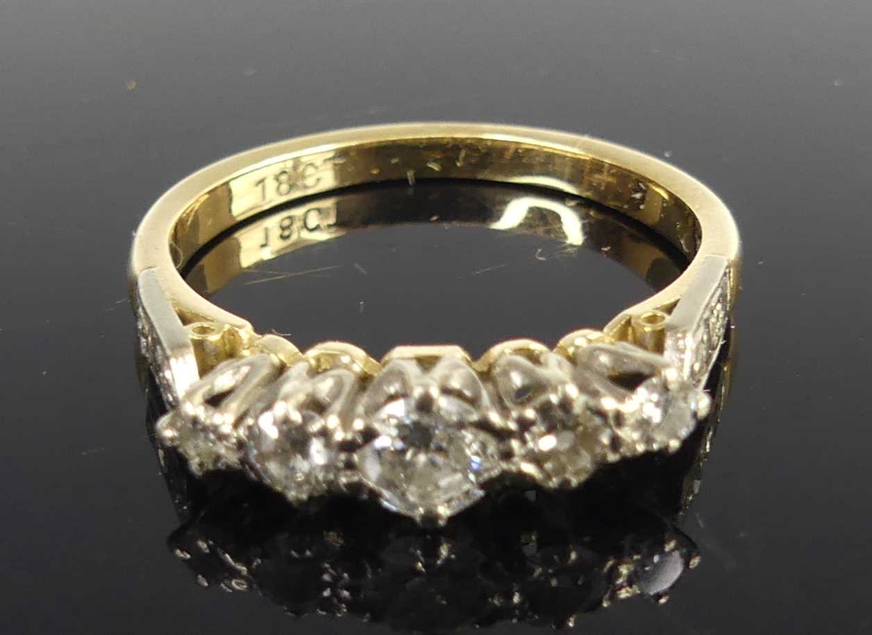 Lot 2101 - A yellow and white metal diamond five-stone...