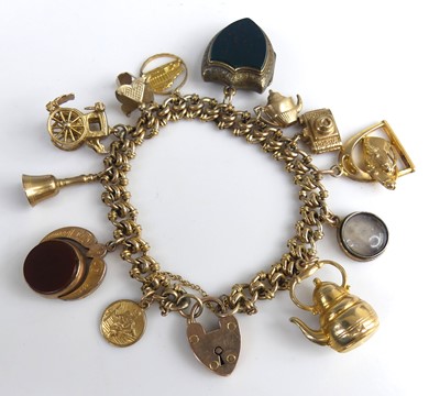 Lot 2125 - A 9ct yellow gold hollow fancy curb link...