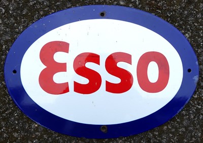 Lot 220 - An enamel on metal oval advertising sign for...