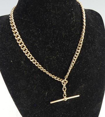 Lot 2127 - A 9ct yellow gold graduated curblink Albert...