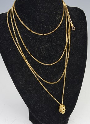 Lot 2129 - A yellow metal long oval belcher link guard...