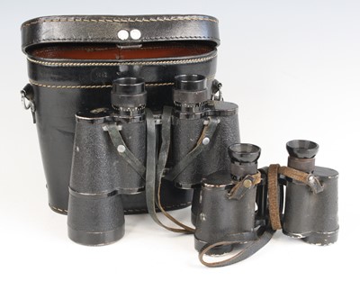 Lot 3134 - A pair of WW II period binoculars, the left...
