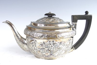 Lot 2071 - A George III silver teapot, of oval form with...