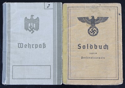 Lot 3186 - A German Third Reich Wehrpass and Soldbuch,...