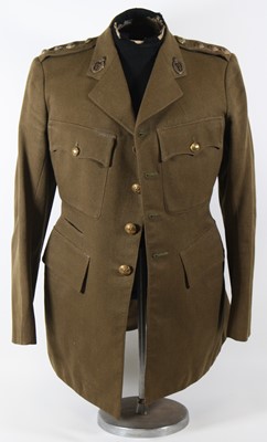 Lot 3189 - A British Army tunic to a Captain in the Royal...
