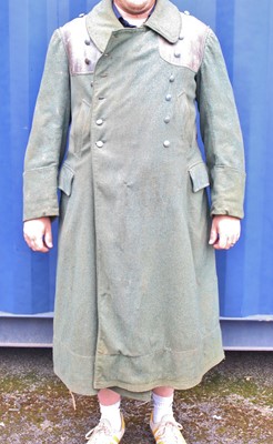 Lot 3194 - A German Wehrmacht winter coat, the double...