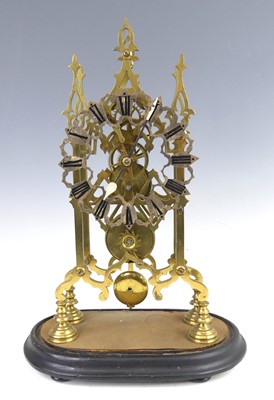 Lot 2275 - A Victorian brass skeleton clock under glass...