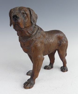 Lot 2167 - A Black Forest carved wooden standing St...
