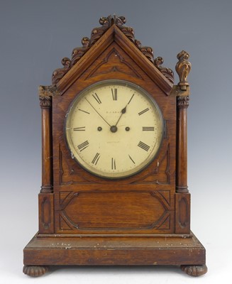 Lot 2274 - E.J. Dent of London - a Victorian Gothic oak...