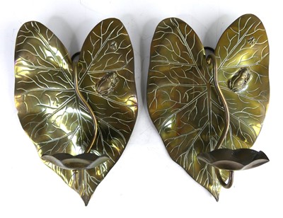 Lot 171 - A pair of Arts & Crafts brass wall sconces,...