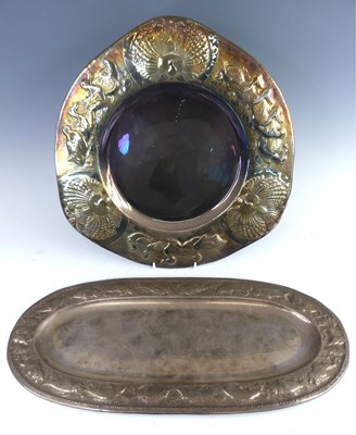 Lot 164 - An Arts & Crafts silver plated dish, the proud...
