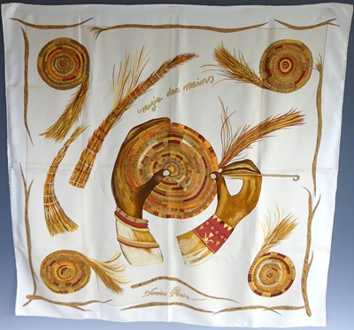 Lot 153 - Hermès - a "Magie des Mains" silk scarf,...