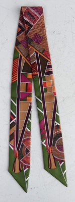 Lot 146 - Hermès - a Twilly silk scarf, bright colour...