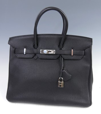 Lot 156 - Hermès - a Birkin 35 black leather handbag,...