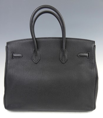 Lot 156 - Hermès - a Birkin 35 black leather handbag,...