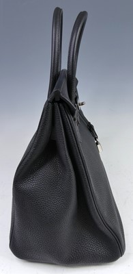 Lot 156 - Hermès - a Birkin 35 black leather handbag,...