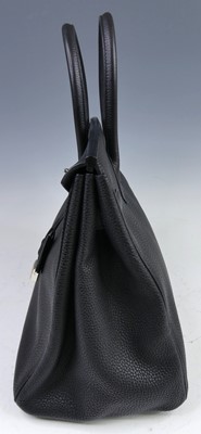 Lot 156 - Hermès - a Birkin 35 black leather handbag,...