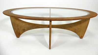 Lot 369 - A 1960s G-Plan teak 'Astro' oval coffee...