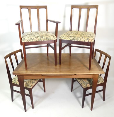 Lot 388 - A 1960s teak dining suite, comprising; a...