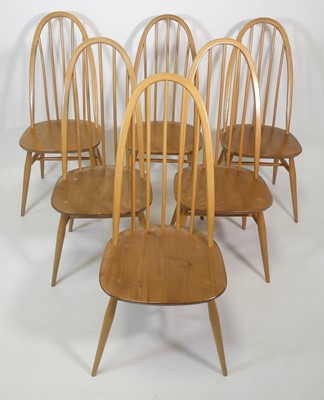 Lot 399 - A set of eight Ercol blond elm and beech...