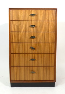 Lot 387 - A 1960s teak compact six-drawer chest, with...