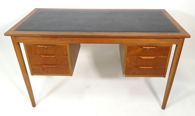 Lot 380 - A 1960s Danish teak kneehole writing...