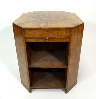 Lot 363 - An Art Deco figured walnut octagonal two-tier...