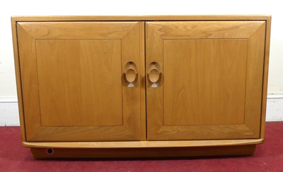 Lot 396 - An Ercol blond elm 'Windsor' double door low...