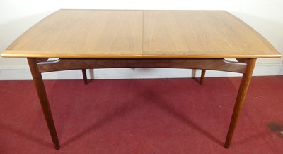 Lot 366 - A 1960s G-Plan teak extending dining...