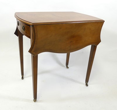 Lot 2304 - A Sheraton Revival walnut and inlaid butterfly...
