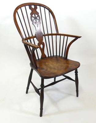 Lot 2319 - A 19th century elm seat and beech wood Windsor...